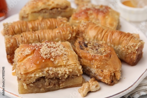 Eastern sweets. Pieces of tasty baklava on table, closeup