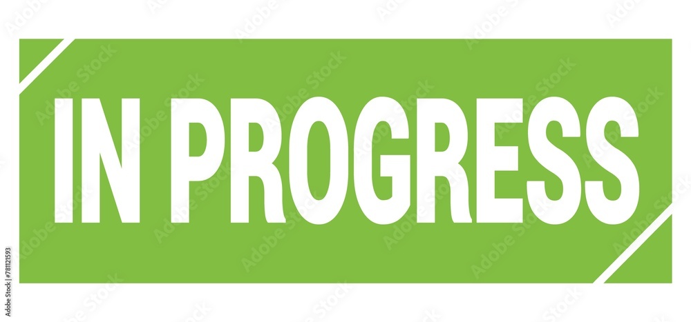 IN PROGRESS text written on green stamp sign. IN PROGRESS text written on green stamp sign.