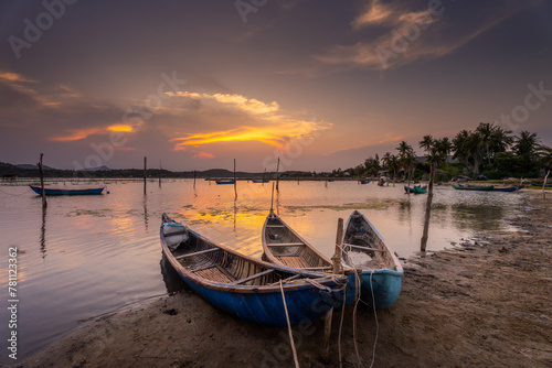 Traditional boats at O Loan lagoon in sunset  Phu Yen province  Vietnam