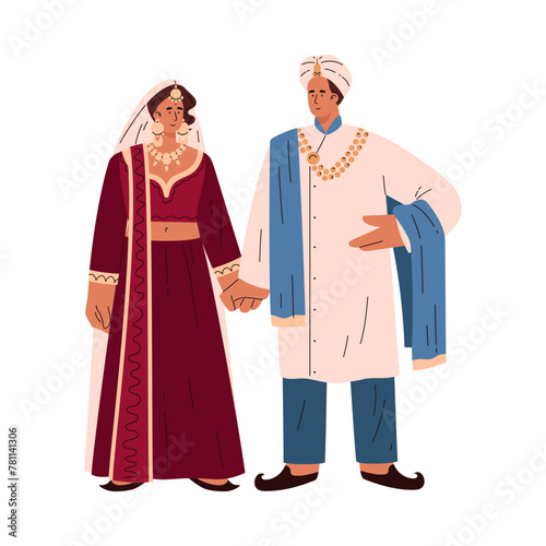 Indian wedding couple in traditional attire on isolated background.