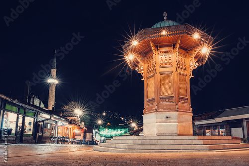 Sarajevo's iconic Sebilj fountain: A symbol of the city's rich heritage, illuminated against the night sky in Bascarsija distict photo