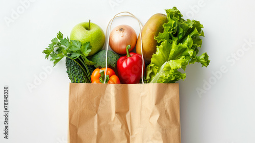 Organic vegetables in eco shopping bag on white background. Healthy food selection. Eco friendly reusable shopping bag with fresh organic vegetables. food delivery, online shopping, farm products photo