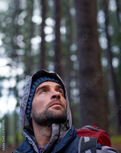 Man, hiking and nature for wellness with backpack, gear and fitness for sports, recreation and health. Male person, hiker and trail for wellbeing, strength and endurance in forest for adventure