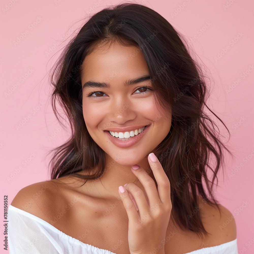 Photo of a model with dark hair, dressed in white and smiling at the camera, showing her manicure on a pink background, with her hand in front of her body, close-up shot, advertising style. Photo of a model with dark hair, dressed in white and smiling at the camera, showing her manicure on a pink background, with her hand in front of her body, close-up shot, advertising style.