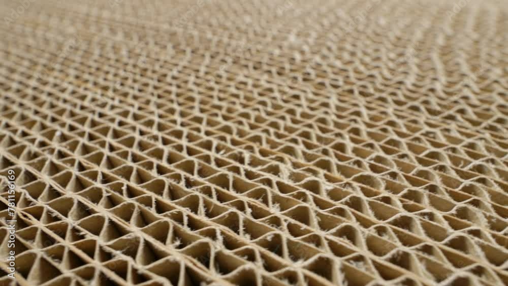 Corrugated cardboard in cross section. Sheets of carton folded in a row Corrugated cardboard in cross section. Sheets of carton folded in a row