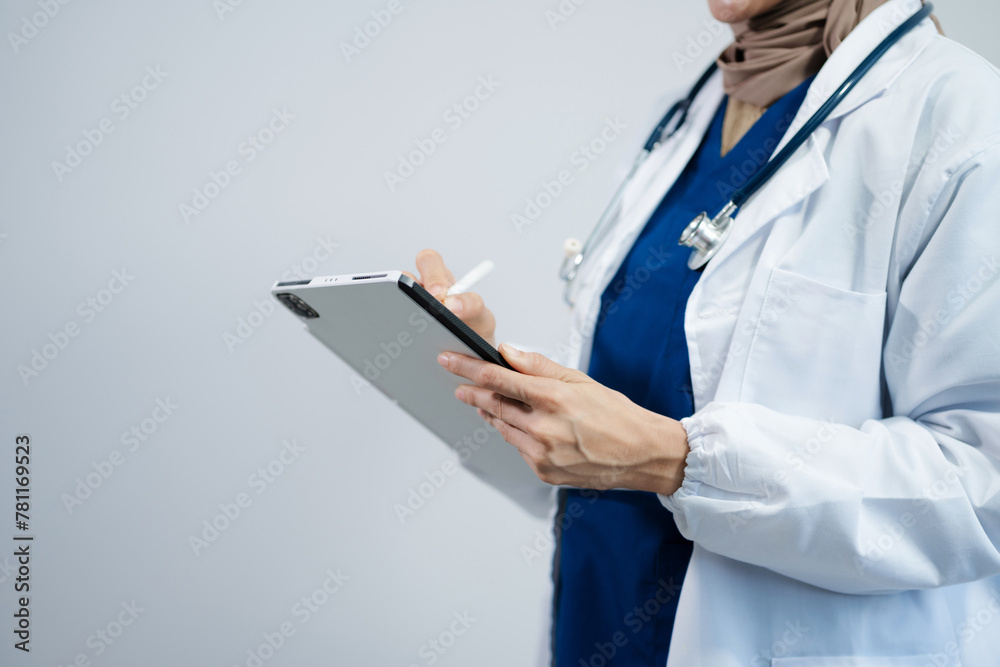 Doctor using clipboard and digital tablet find information patient medical history, isolated on white background. Medical technology concept.
