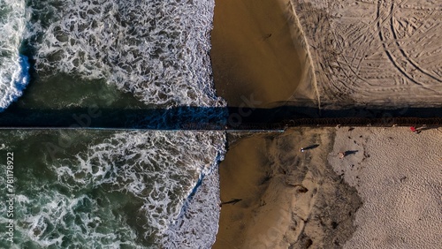 Bild auf Leinwand Aerial shot of border wall between the United States and Mexico, Tijuana