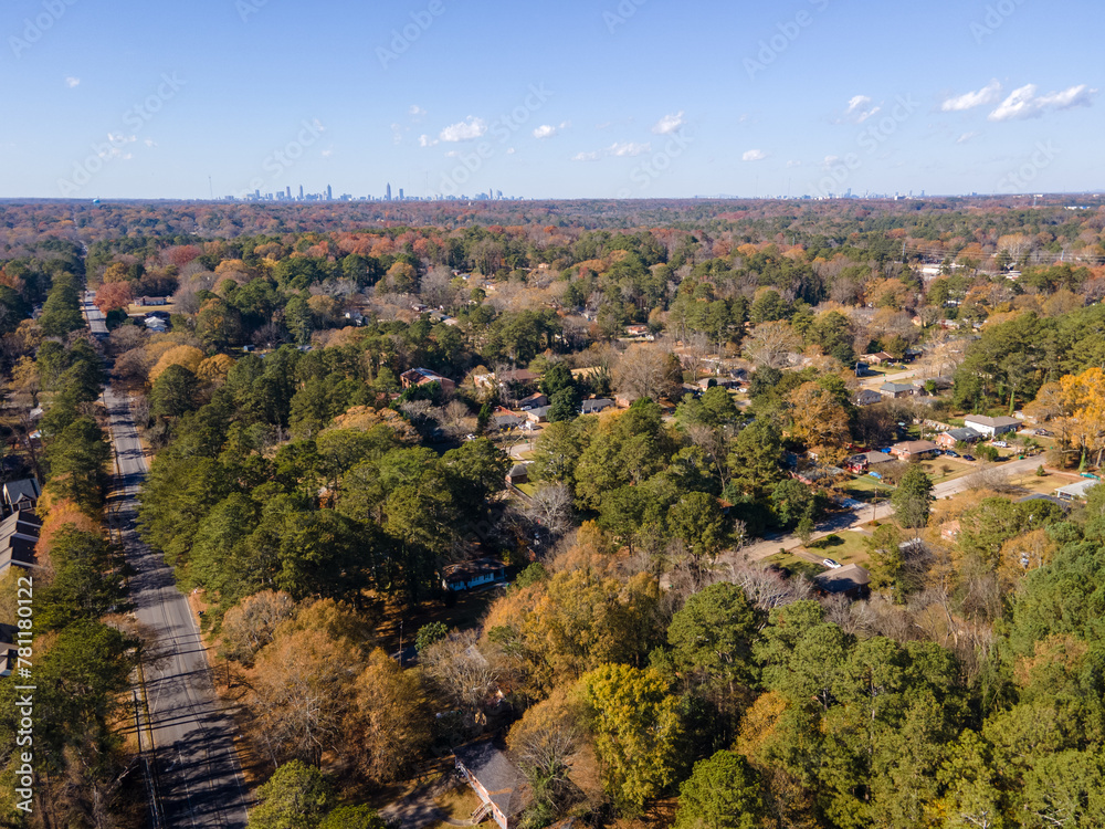 Aerial landscape of residential area and Atlanta skyline during fall at sunset in Decatur Atlanta Georgia