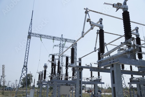 Aerial view of electrical substation surrounded by metal towers