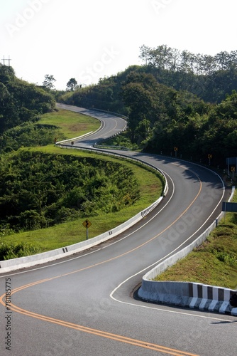 Road curved like a number three in Nan province, Thailand © Wirestock