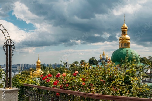 Kiev Pechersk Lavra monastery in Kyiv against a cloudy sky photo