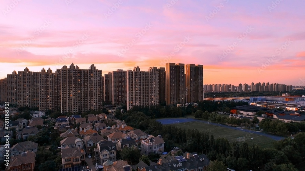 Aerial view of a modern community at sunset