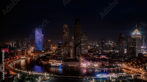 Aerial view of the cityscape at night © Wirestock