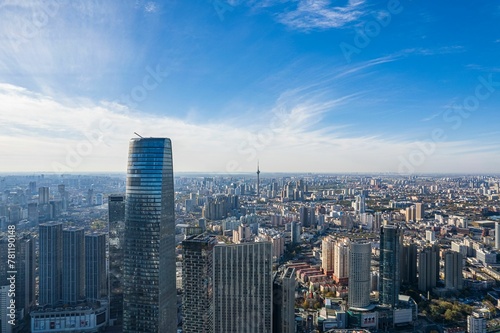 Aerial view of cityscape Tianjin surrounded by buildings