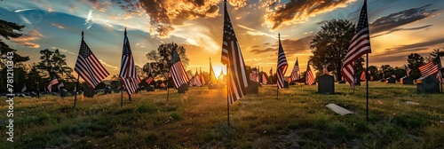 American flags at cemetery during sunset, conveying a mood of reverence and patriotism