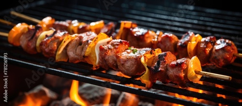 Grilled skewers with meat a...