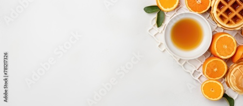Plate of waffles and orange slices
