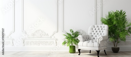 White chair and green plant...