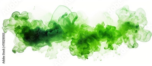 Green ink swirls on white surface photo