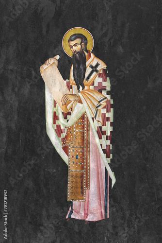 Christian traditional image of Basil of Caesarea. Religious illustration on black stone wall background in Byzantine style