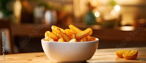 Bowl of crispy fries on the...