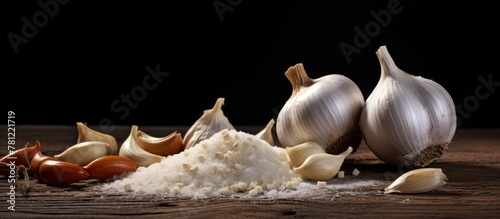 Garlic on wooden surface