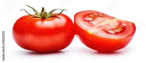 Halved tomatoes on white su...
