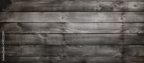 Weathered wooden panel on a dark backdrop