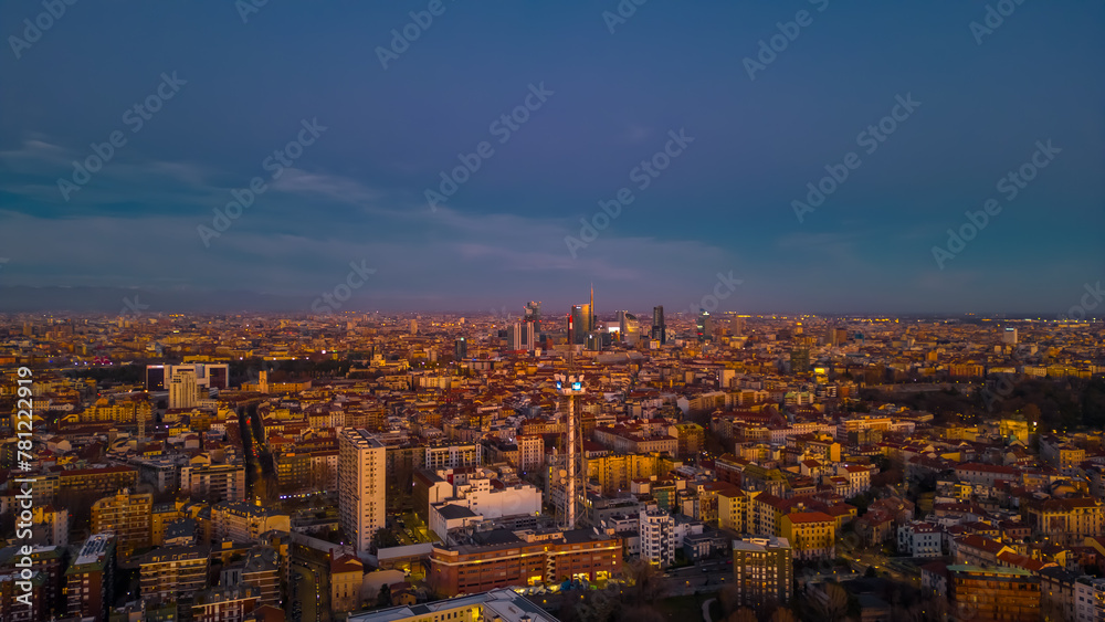 Cityscape from drone of Milan at sunset. Copy space.