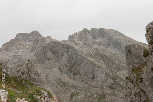 Breathtaking view of the rocky mountains in Naranjo de Bulnes, Asturias, Spain photo