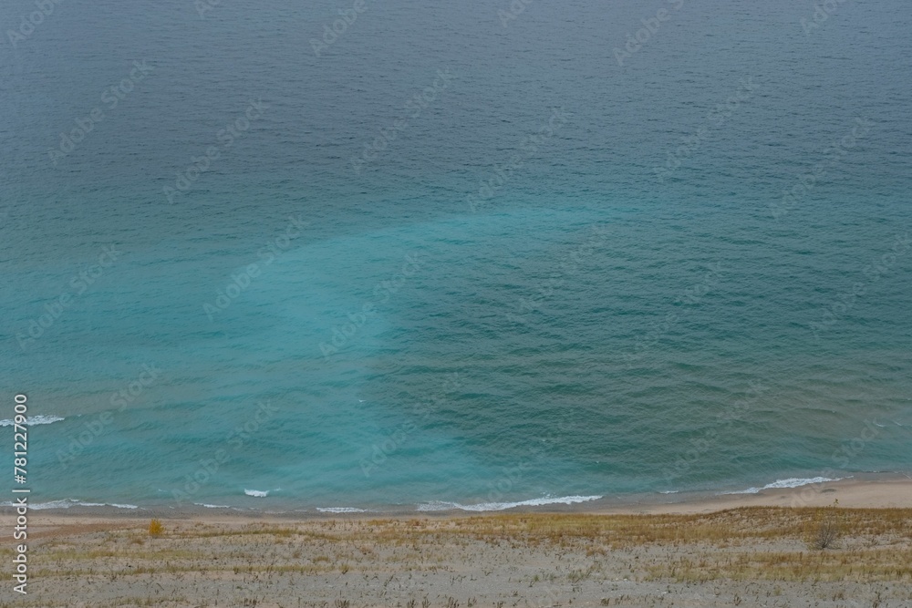 Sandy beach with blue water