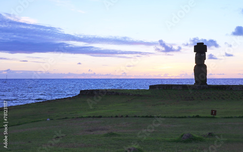Silhouette of Moai with Pukao (Hat) of Ahu Ko Te Riku Ceremonial Platform, with Pacific Ocean in the Backdrop, Easter Island, Chile, South America photo