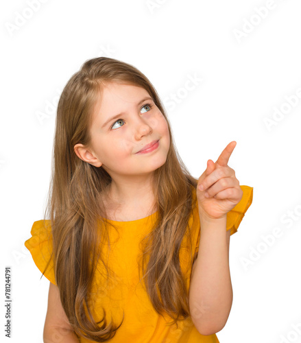 Closeup portrait of pretty little girl with long hair smiling and pointing aside isolated over white background. Mock up with little child.