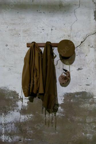 Old military clothes hanging on a hanger