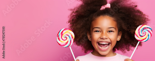 Girl Holding Two Lollipops