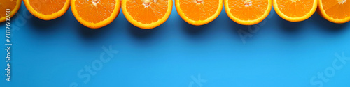 Savor the zest: droplets shimmer, embodying the vibrant tang and natural sweetness of freshly squeezed oranges photo