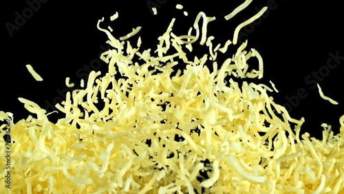 Super slow motion shredded cheese. High quality FullHD footage photo