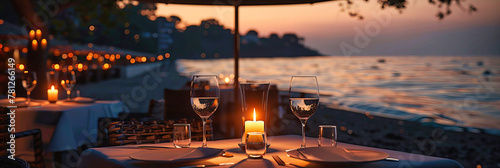 Romantic Sunset Dinner on the Beach with Elegant Glassware and Candlelight, Setting the Mood for a Memorable Evening