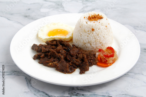 Freshly cooked Filipino food called Tapsilog photo