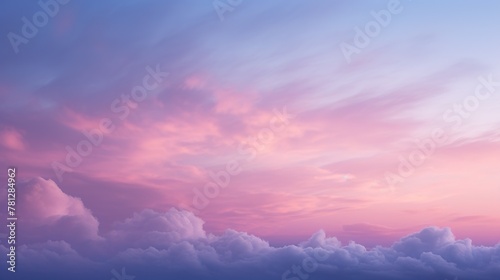 An ethereal skyscape with sweeping clouds in hues of pink and blue during twilight photo