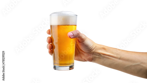 Hand holding a glass of cold beer with frothy foam
