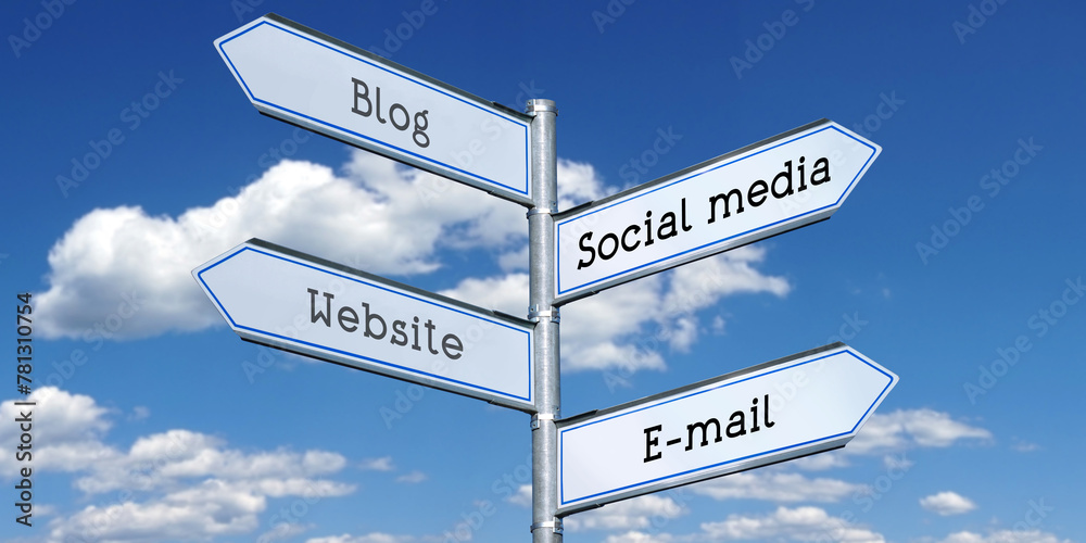 Blog, social media, website, e-mails - metal signpost with four arrows Blog, social media, website, e-mails - metal signpost with four arrows