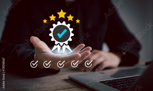 Concept of guarantee standards iso certification and standardization service quality and assurance : Businessman Is using finger touching for certify with five star after he has verified it.	