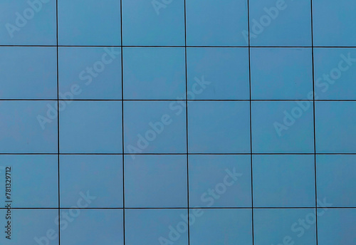Contemporary Facade Design. Square Pattern in Modern Building Wall. Abstract canvas, background. Blue, gray and black colors.
