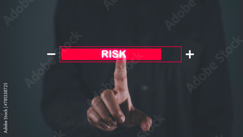 Businessman touch on indicator rating chance level to increase exposure for danger financial investment, Reduction strategy. Risk management control, High and low impact for business security.