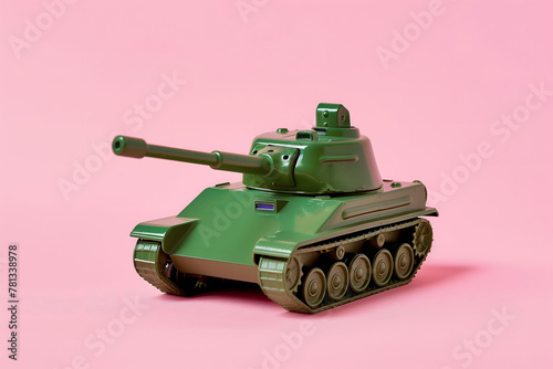 Green tank toy model, Isolated on neutral pink background photo