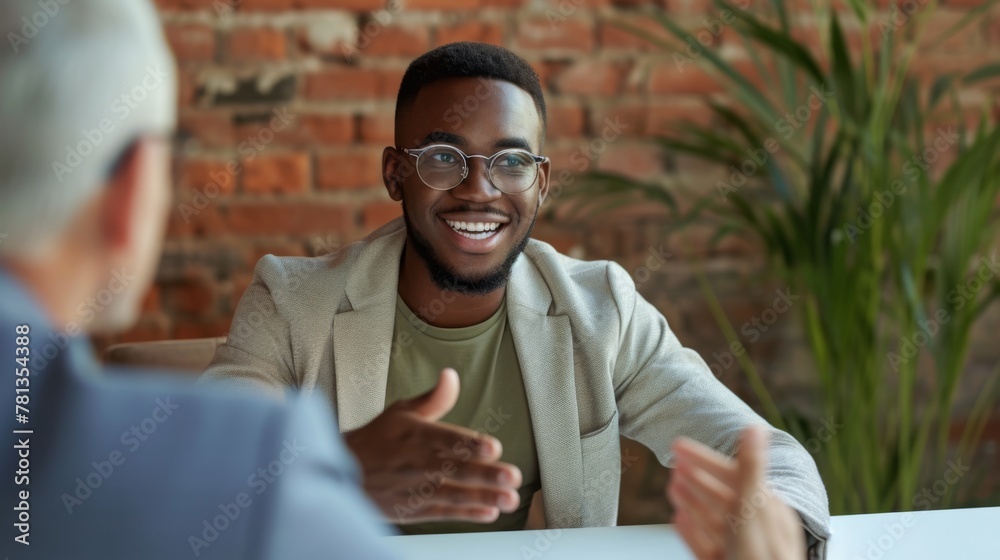 Smiling professional at a meeting - obrazy, fototapety, plakaty 