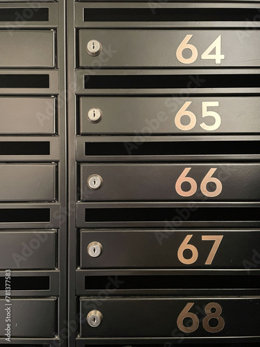 Array of Mailboxes With Numbered Labels
