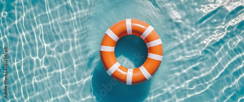 An orange-striped lifebuoy floats on the crystal clear waters of a sparkling swimming pool. Generative AI