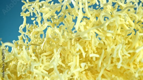 Super slow motion shredded cheese. High quality FullHD footage photo